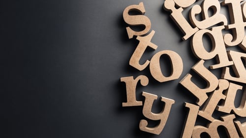 Story Wood Letters on dark background. Blogpost about storytelling and innovation.